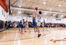 Holy Trinity Catholic Boys Pull Away from Van Buren County, 70–34