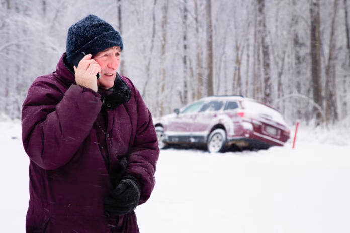 Senior man calling for help during snow storm