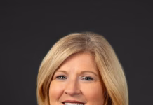 Iowa House OKs HMO tax hike to draw millions in federal matching fund