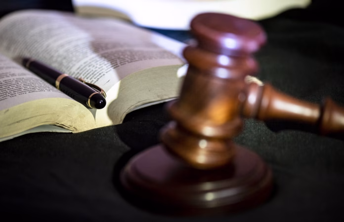 Judge banging the gavel at court