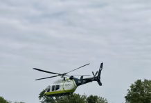 Emergency Responders Rescue Person from Submerged Vehicle