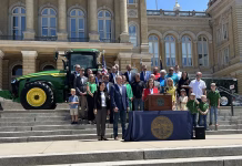 Gov. Reynolds signs bill supporting ethanol-powered ag equipment