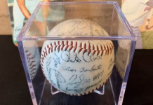 Baseball signed by Pete Rose sits in Iowa Treasurer’s vault