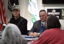 Sand supports letting Iowa prison workers bargain as public safety employees