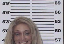Moravia Woman Charged After Allegedly Brandishing Knife at Residence